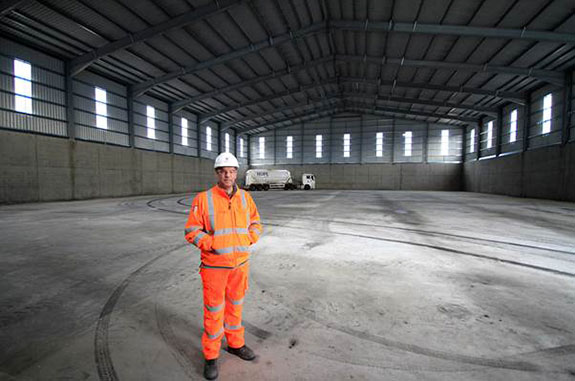 Hope Construction Materials' Industrial Director Ashley Bryan inside the 20,000 tonne capacity clinker store at Hope Works