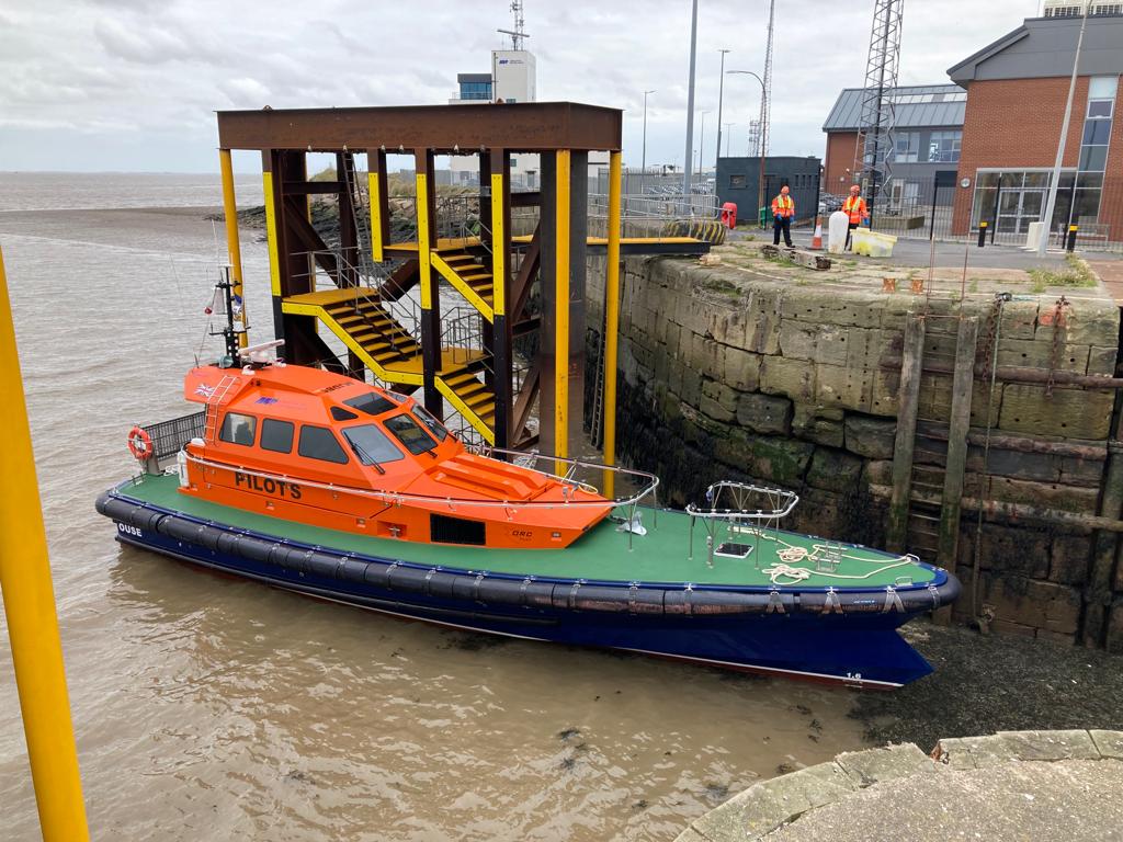 Pilot Boat Moored Against New Structure